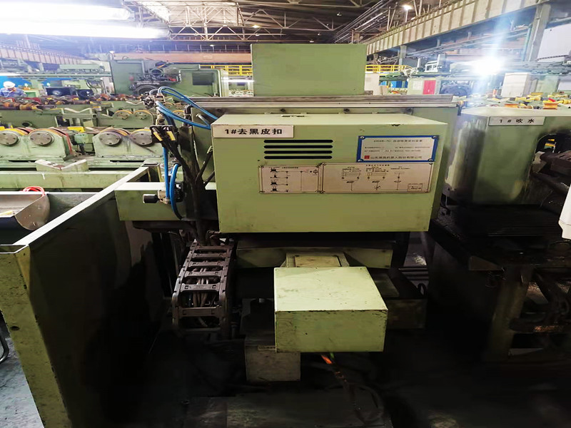 Automatic black leather buckle removing and grinding equipment.jpg Automatic black leather buckle removing and grinding equipment.jpg